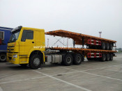 Tractor Truck Hauling 40ft Container Trailer